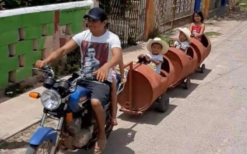 Yucatán: Papá construye un tren con barriles para jugar con sus hijos