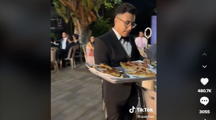 (VÍDEO) Critican a pareja por dar pizzas de 'Little Caesars' en su boda