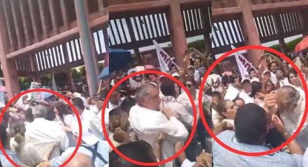 VIDEO: Adán Augusto da codazo a mujer que lo protegía en evento de campaña