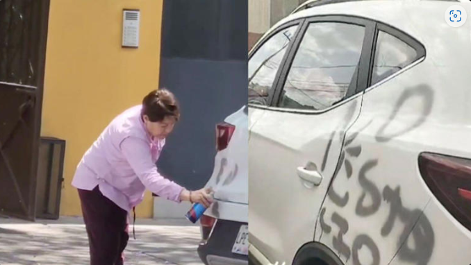 (VIDEO) CDMX: Mujer vandaliza camioneta por estacionarse en la entrada de su casa